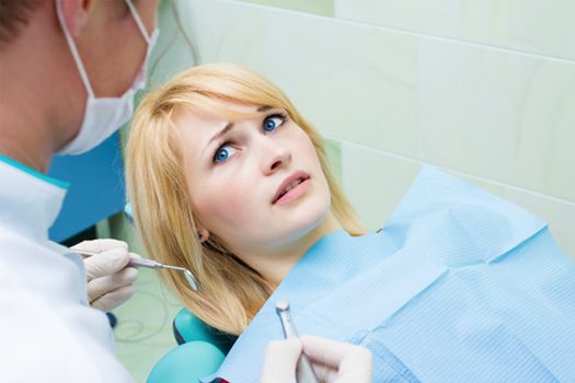 Woman afraid of the dentist